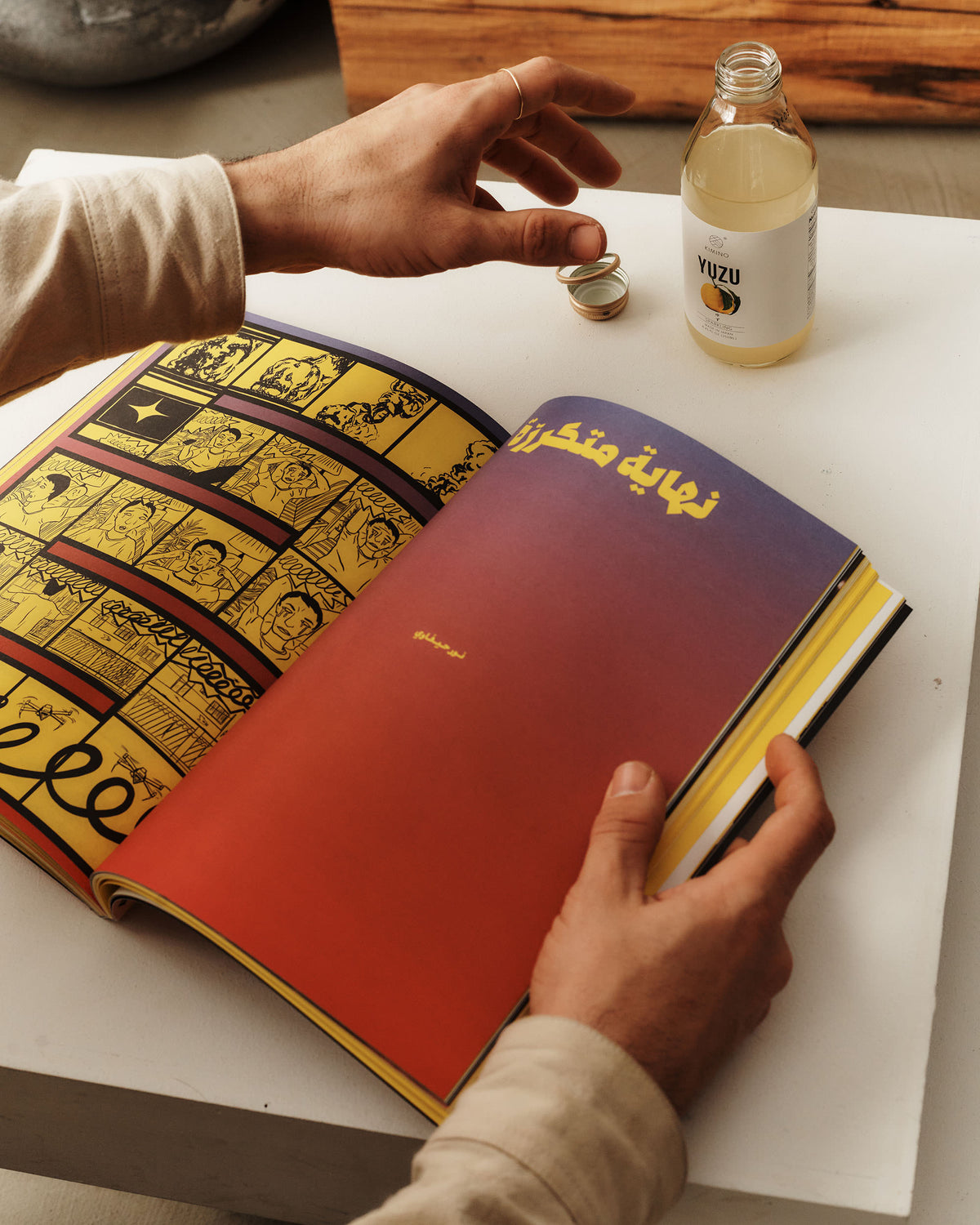 A magazine open on the table at Colbo