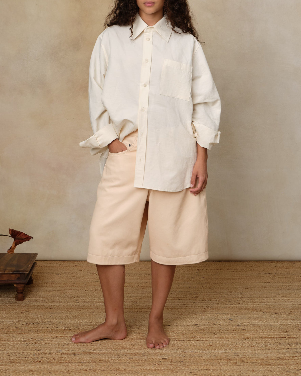 Colbo Metrics Shirt in ivory cotton-linen, on model, worn with cream shorts