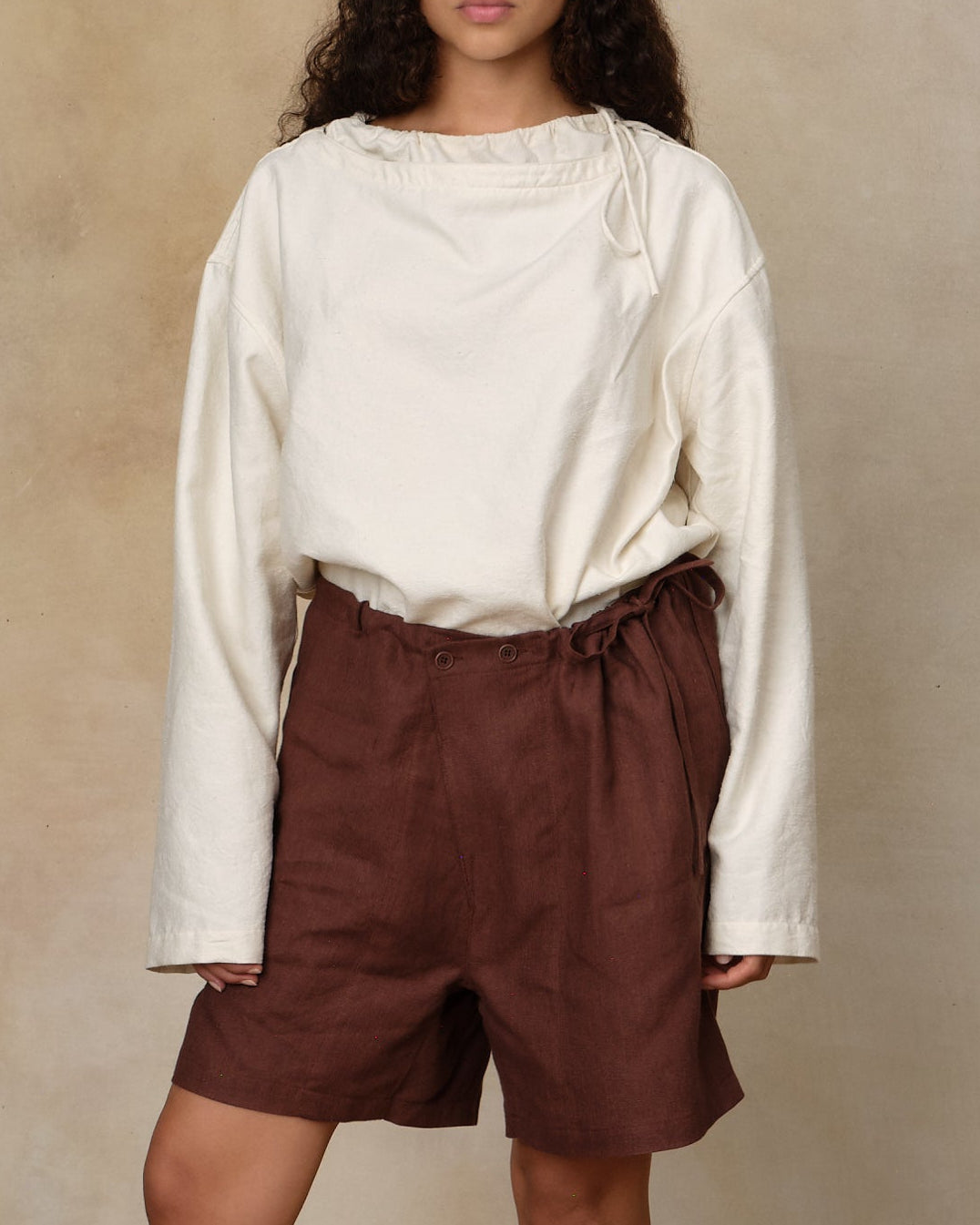 Colbo Mountain Top in natural silk, on model, worn with brown shorts