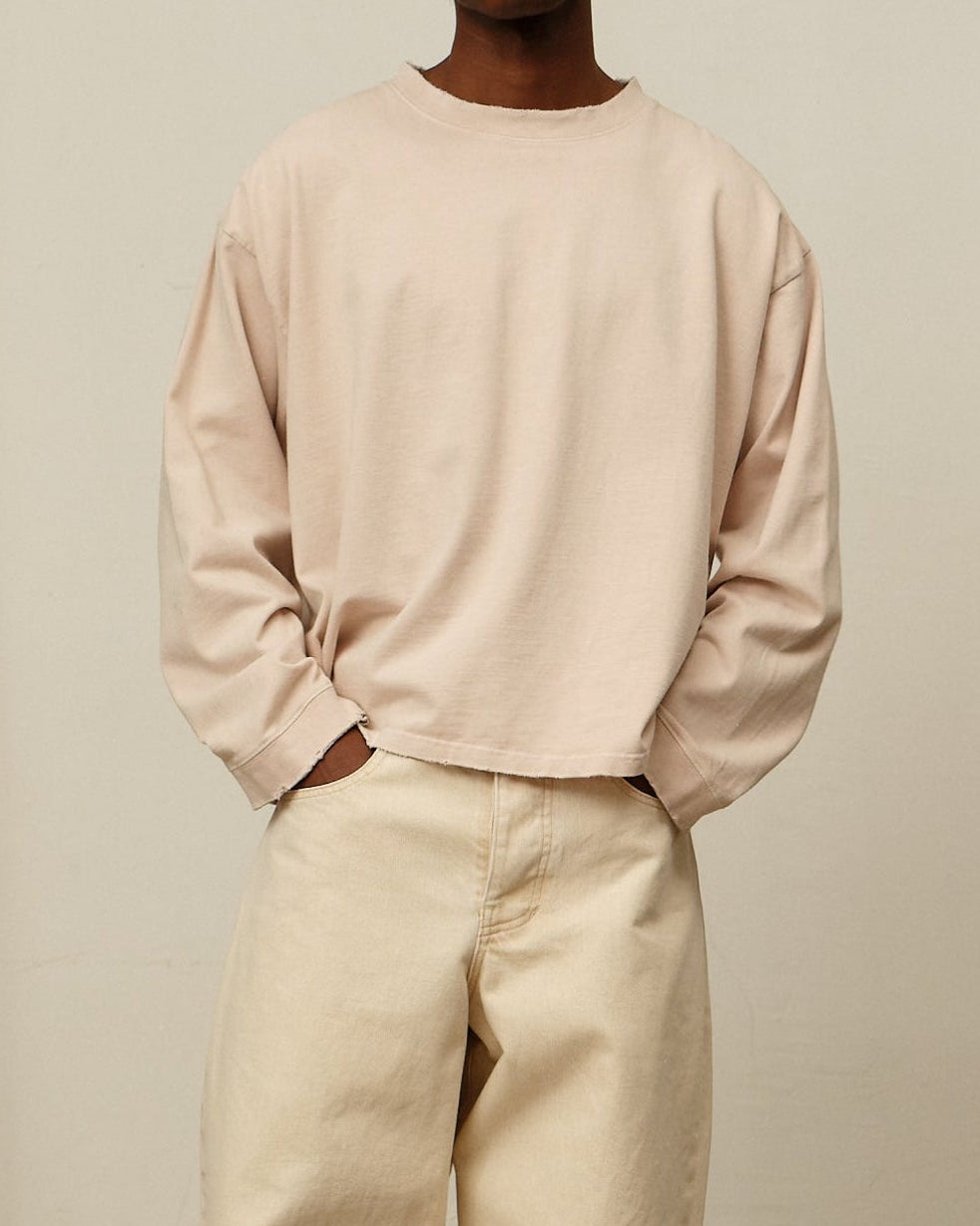 Colbo long sleeve T-shirt in distressed blush cotton, on model, front