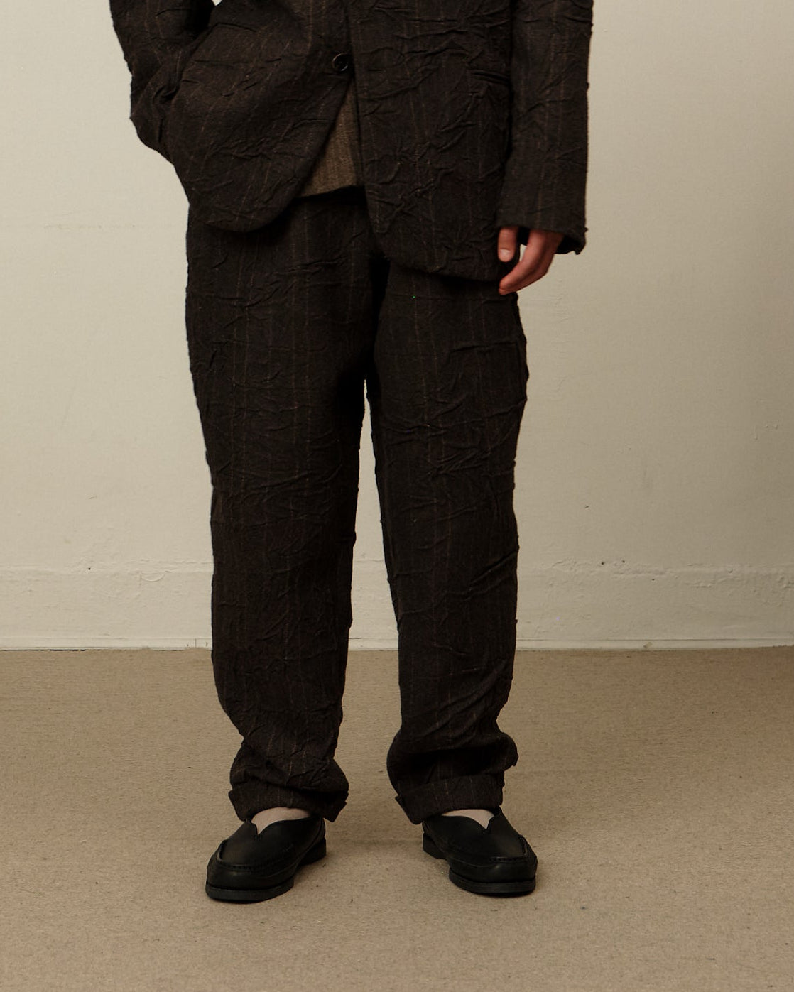 Colbo Camp Pants in striped crinkled wool, on model, front
