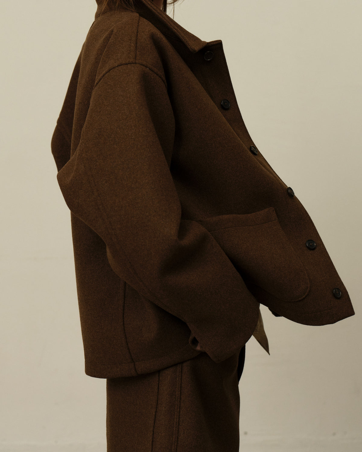 Colbo Steam Jacket in brown on model, side view