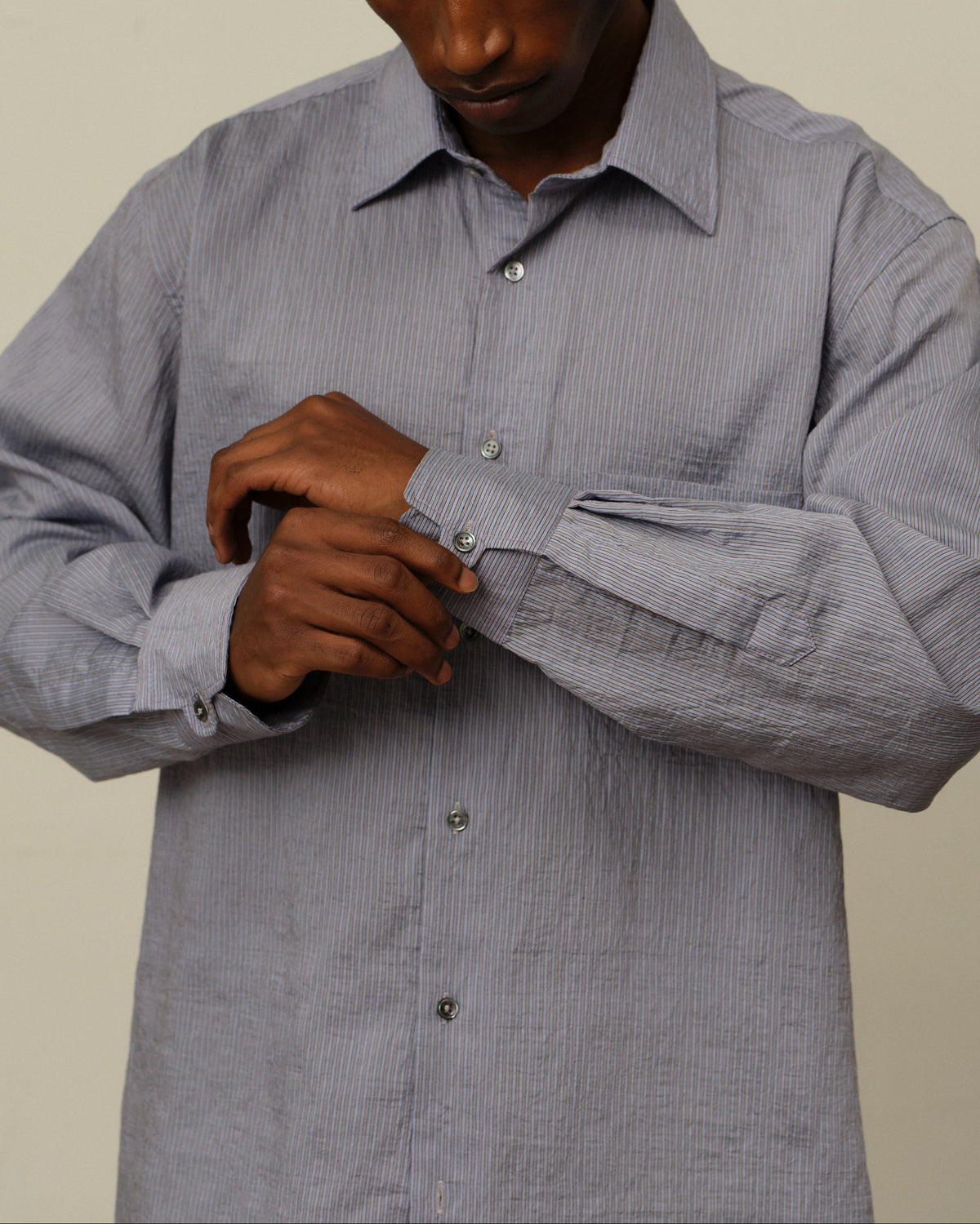 Colbo Pen Shirt in crinkled pinstripe lyocell wide collar, on model