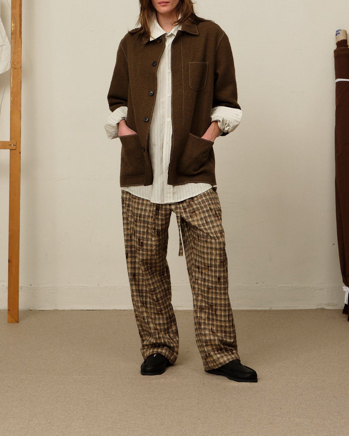 Colbo Light Pants in tweed check 3D on model, full length, with a brown wool jacket and white shirt