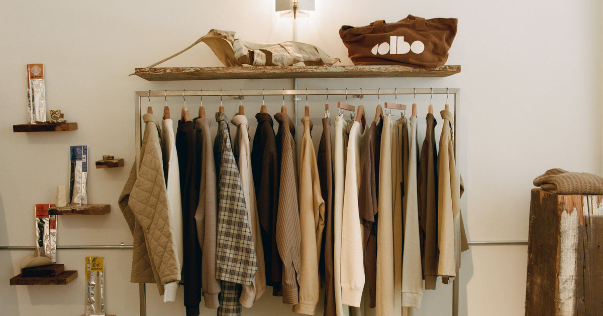 A rail of clothing in the shop