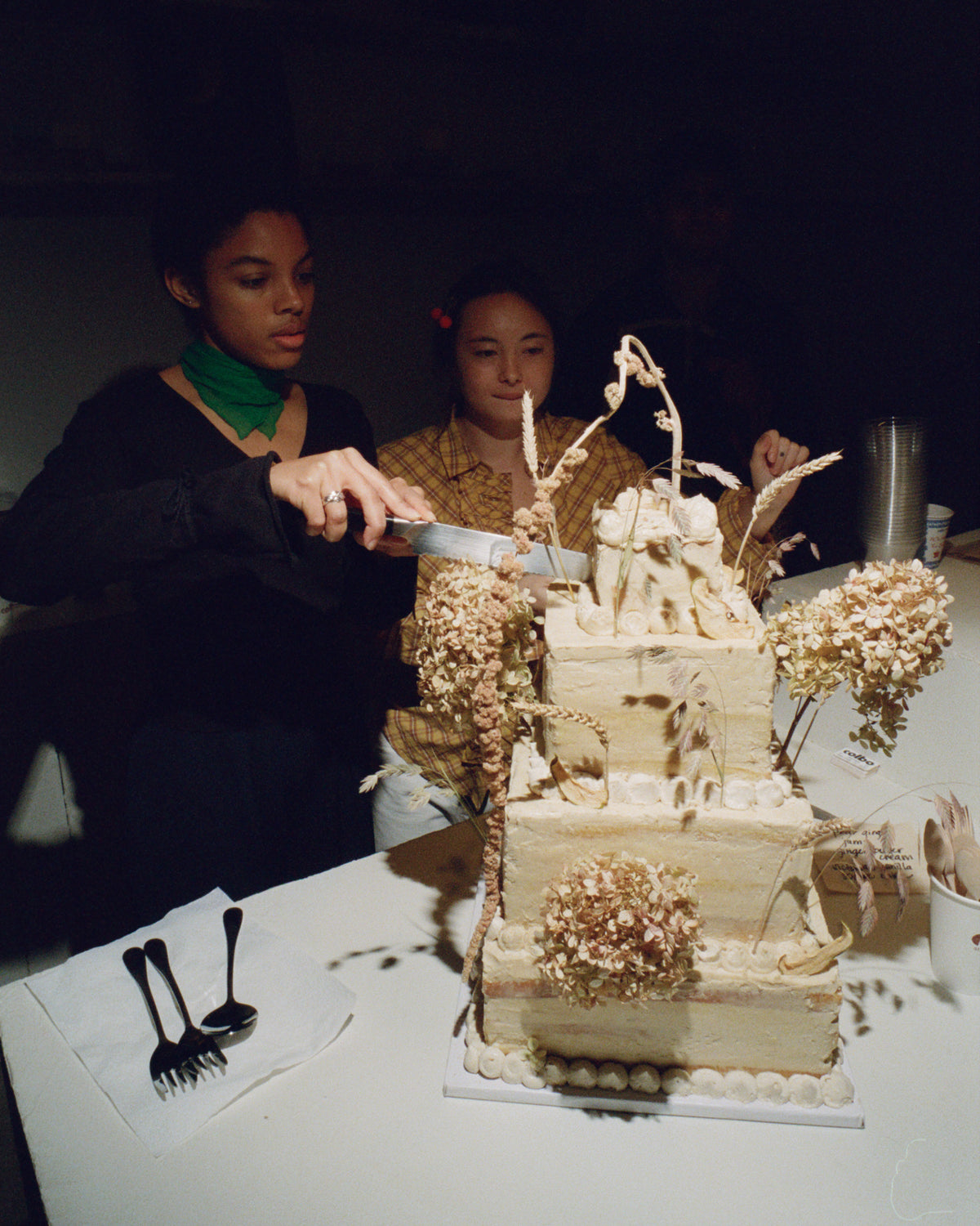 Cutting the cake at a Colbo party