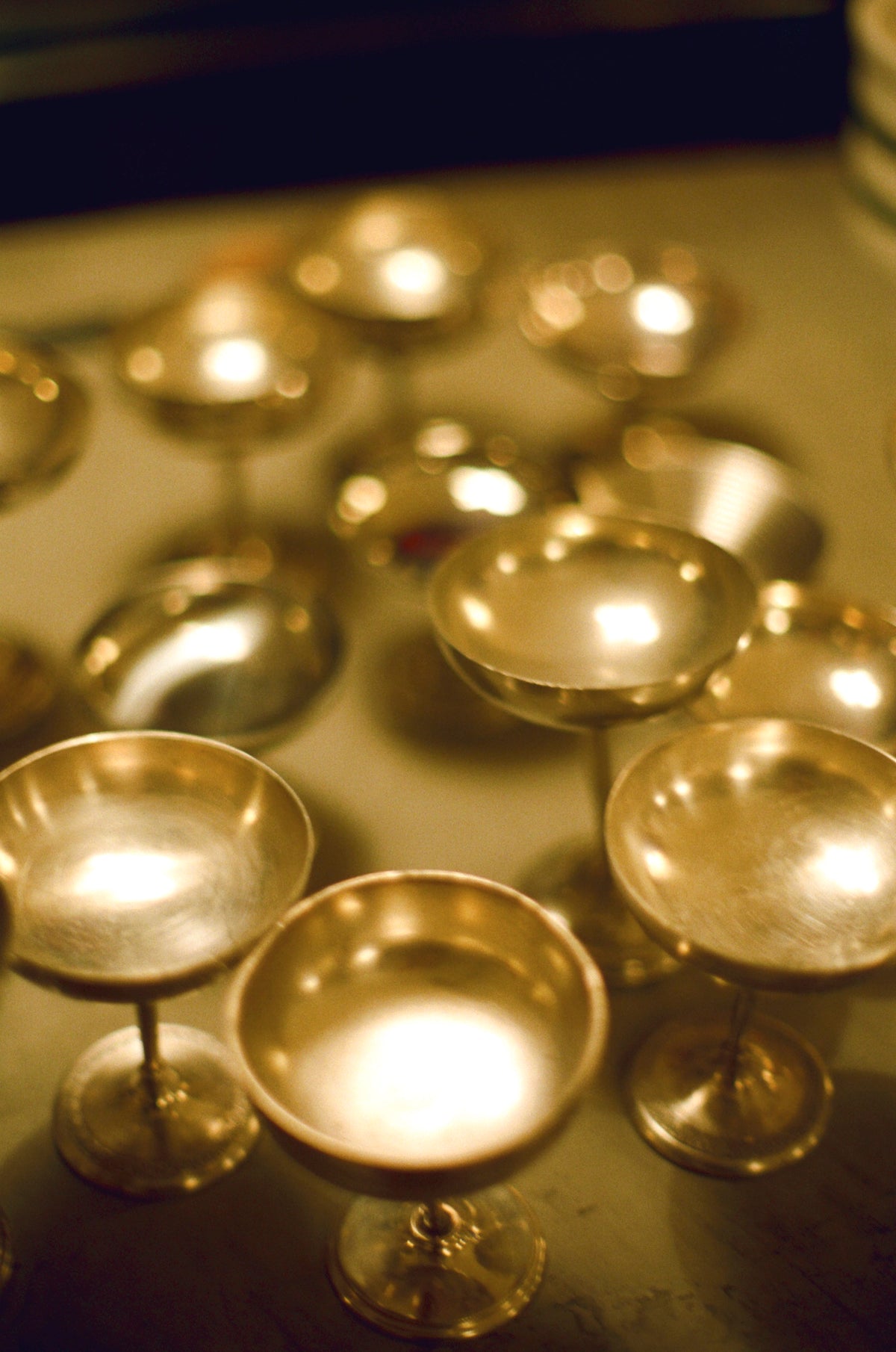 Silver coupes catching the light on the bar at Colbo Next Door