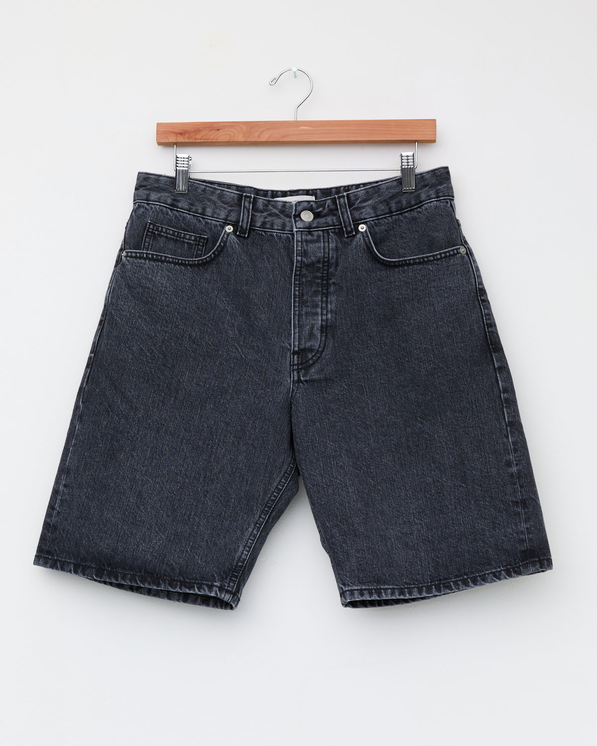 Another Aspect Denim Shorts 1.0 in faded black, front, on hanger