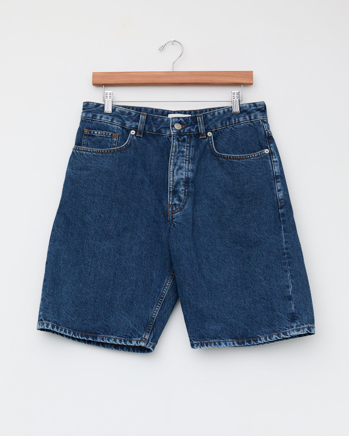 Another Aspect Denim Shorts 1.0 in used blue, front, on hanger