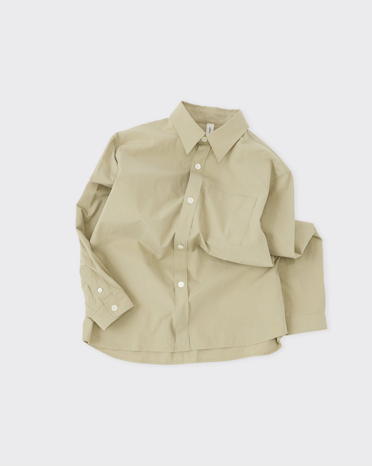 Another Aspect Shirt 4.0 in pale green organic cotton, sleeves loosely folded, flat lay