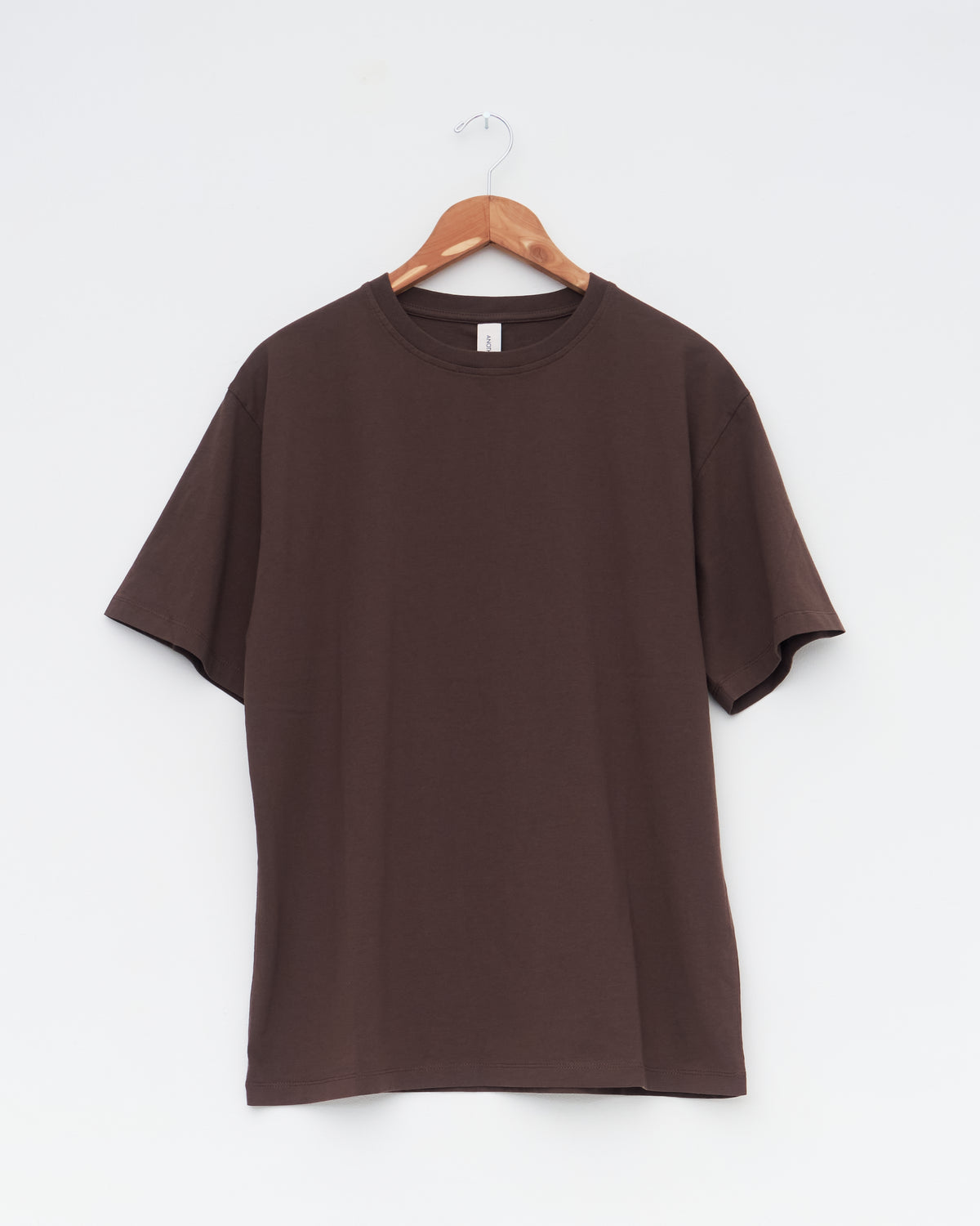 Another Aspect T-Shirt 1.0 in brown organic cotton, front, on hanger