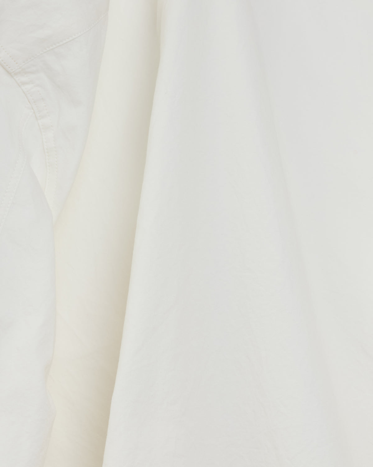 Colbo Bat Shirt in white Japanese cotton, fabric close-up