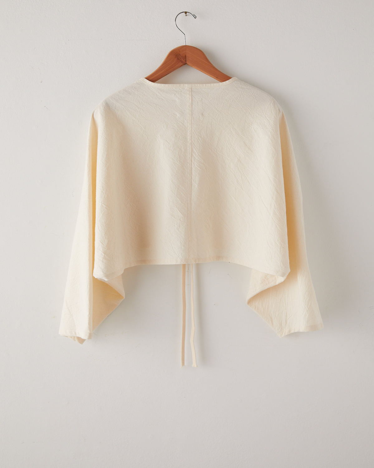 Colbo Cone Top in crinkled Japanese cotton, back, on a hanger