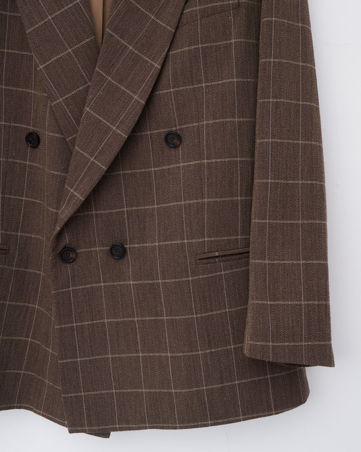 Colbo Double Breasted Blazer in vintage brown plaid Italian wool, lapel and double-breasted button close-up