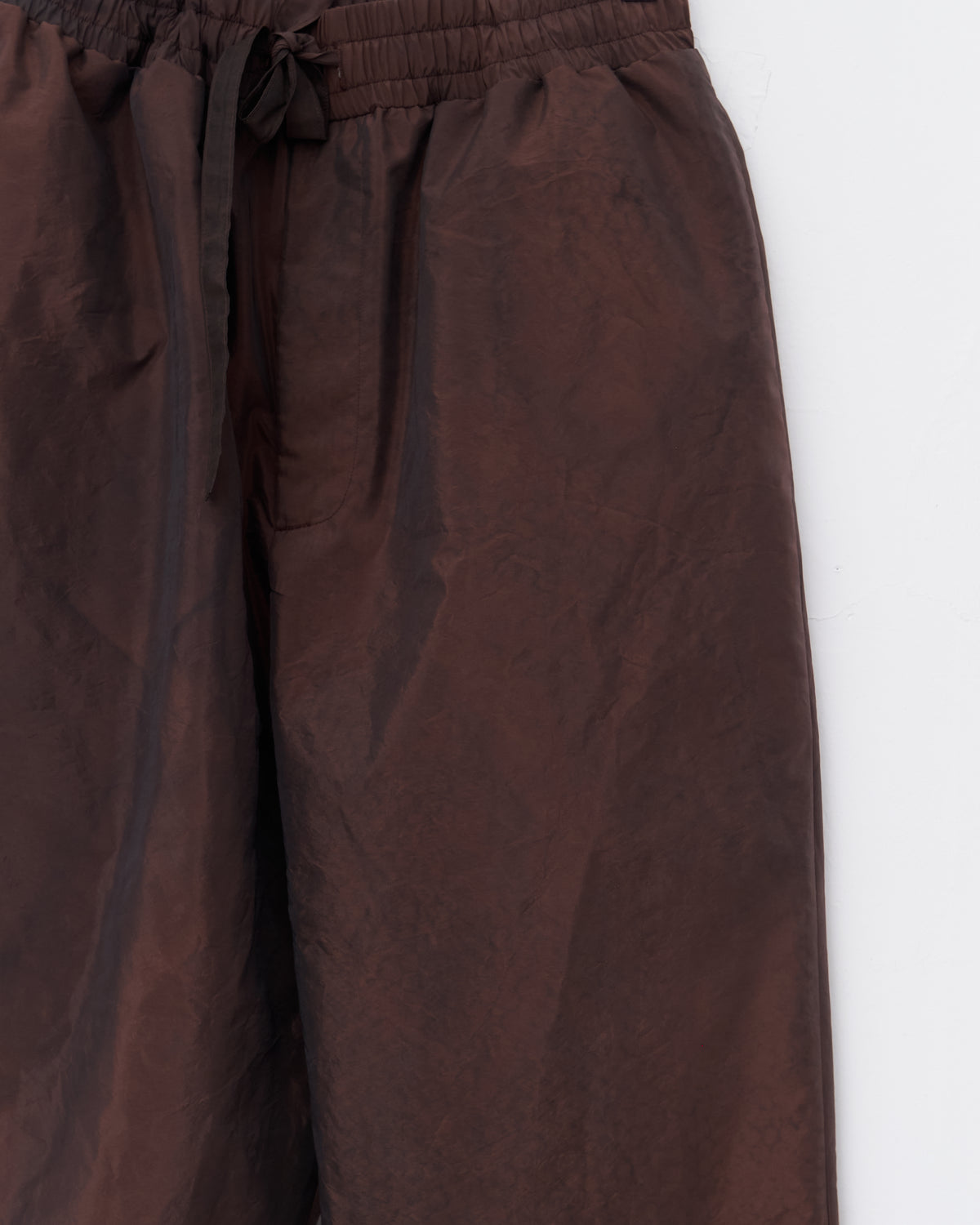 Colbo Draw Pants in washed burgundy Italian fabric, washed fabric close-up