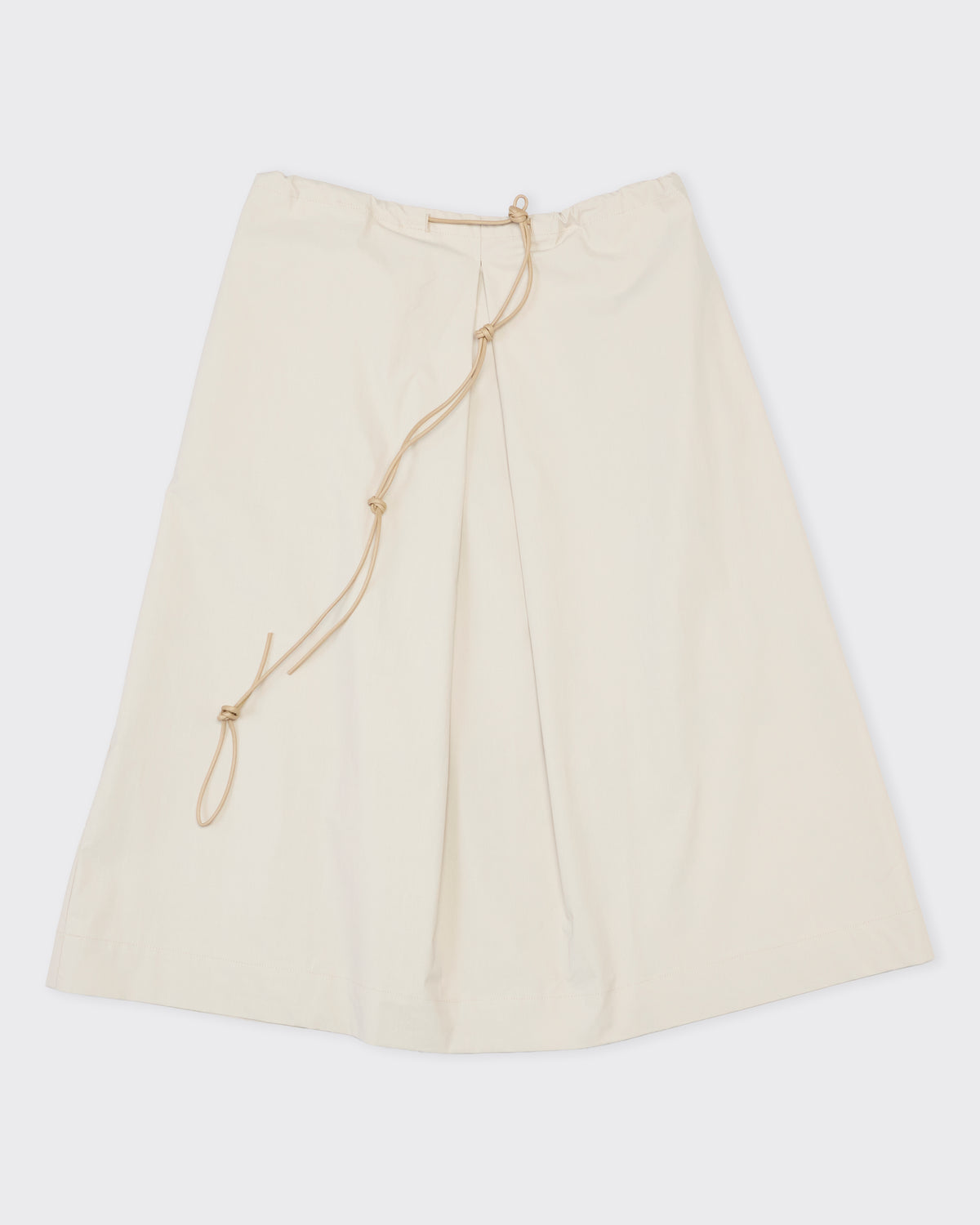 Colbo Draw String Skirt in dual beige cotton, front with drawstring, flat lay