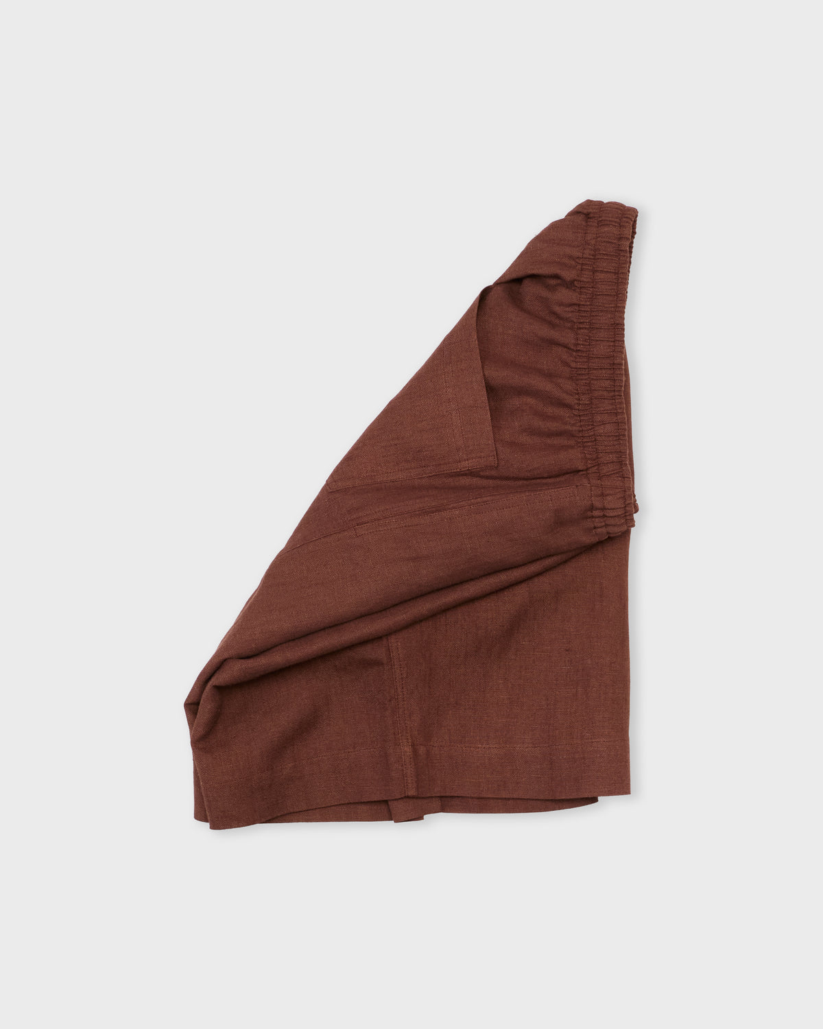 Colbo Elastic Shorts in mahogany, side, flat lay