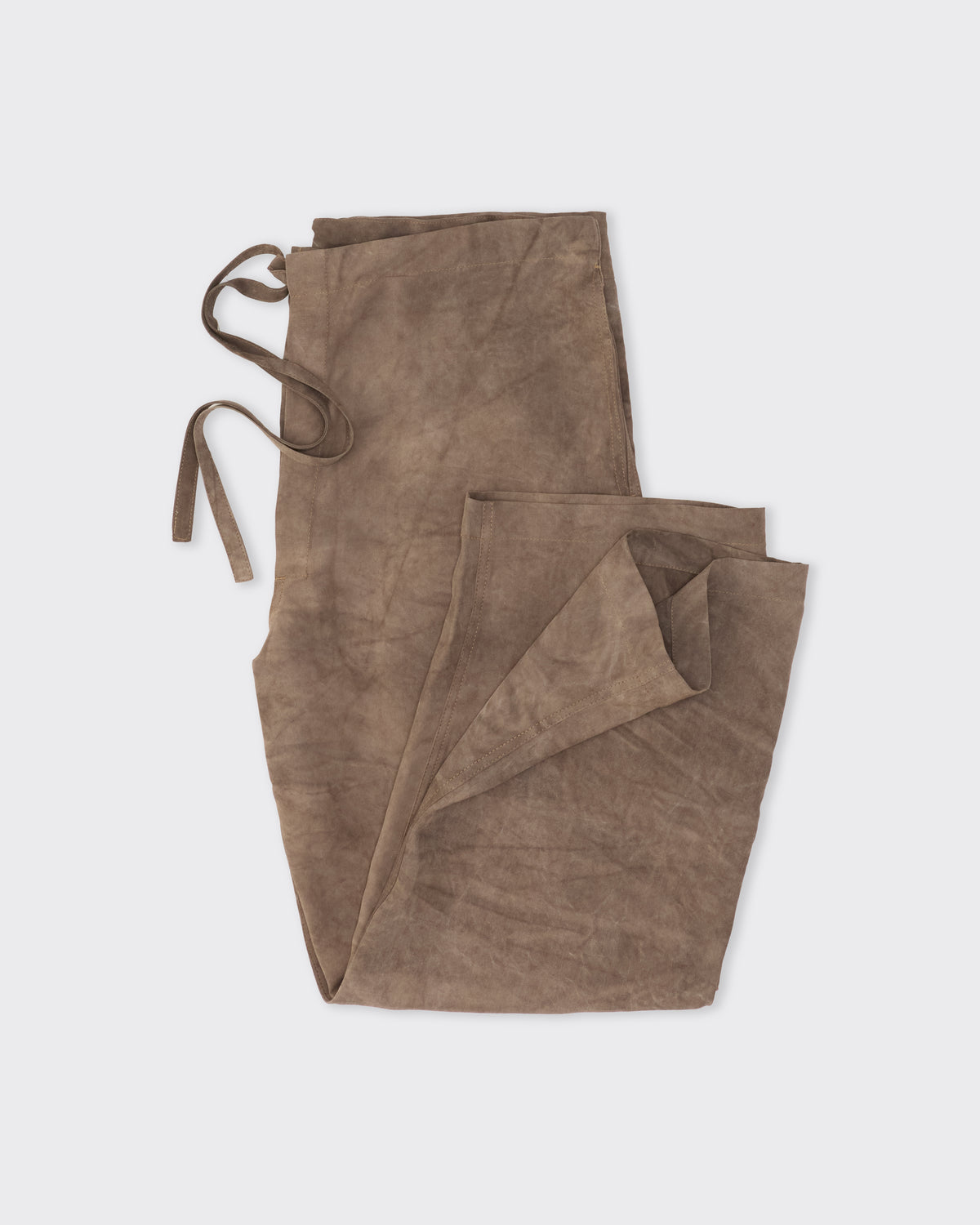 Colbo Farm Pants in cold-dyed greige Italian viscose, folded, flat lay
