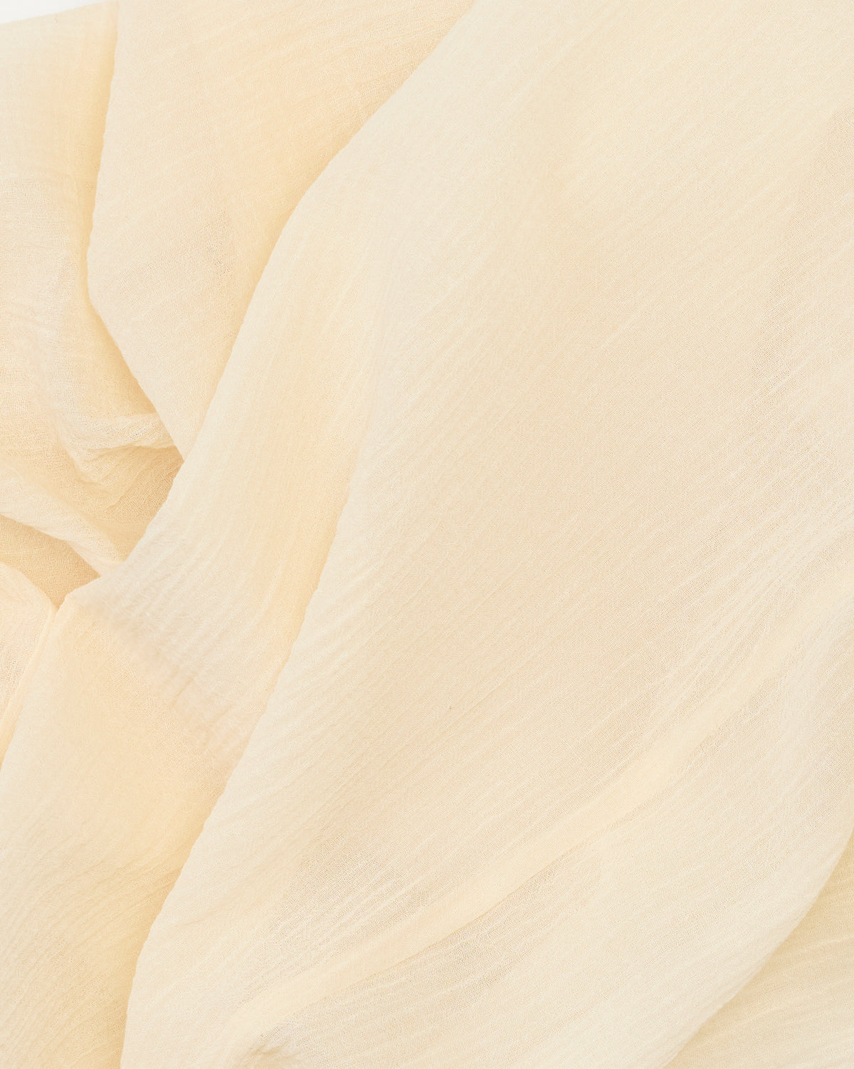 Colbo Light Pants in light sand cotton, fabric drape close-up