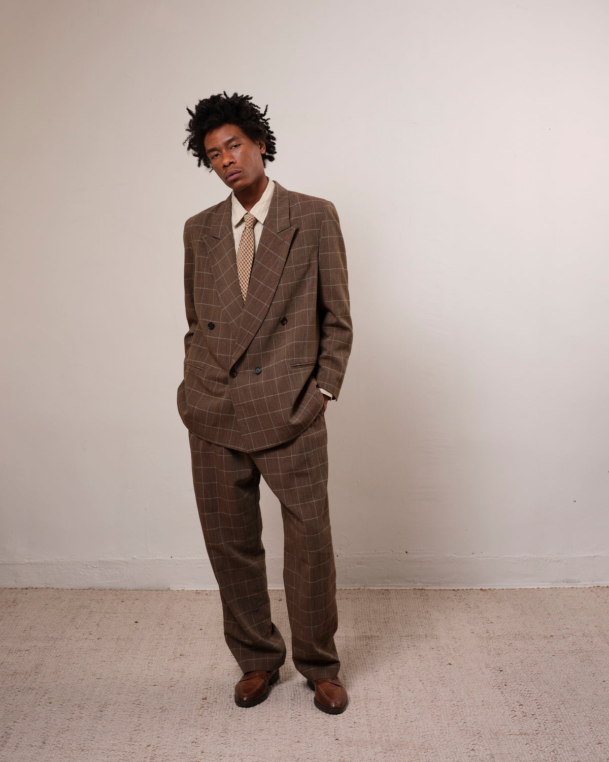 Colbo Double Breasted Blazer in vintage brown plaid Italian wool, on model, worn as a suit with matching trousers