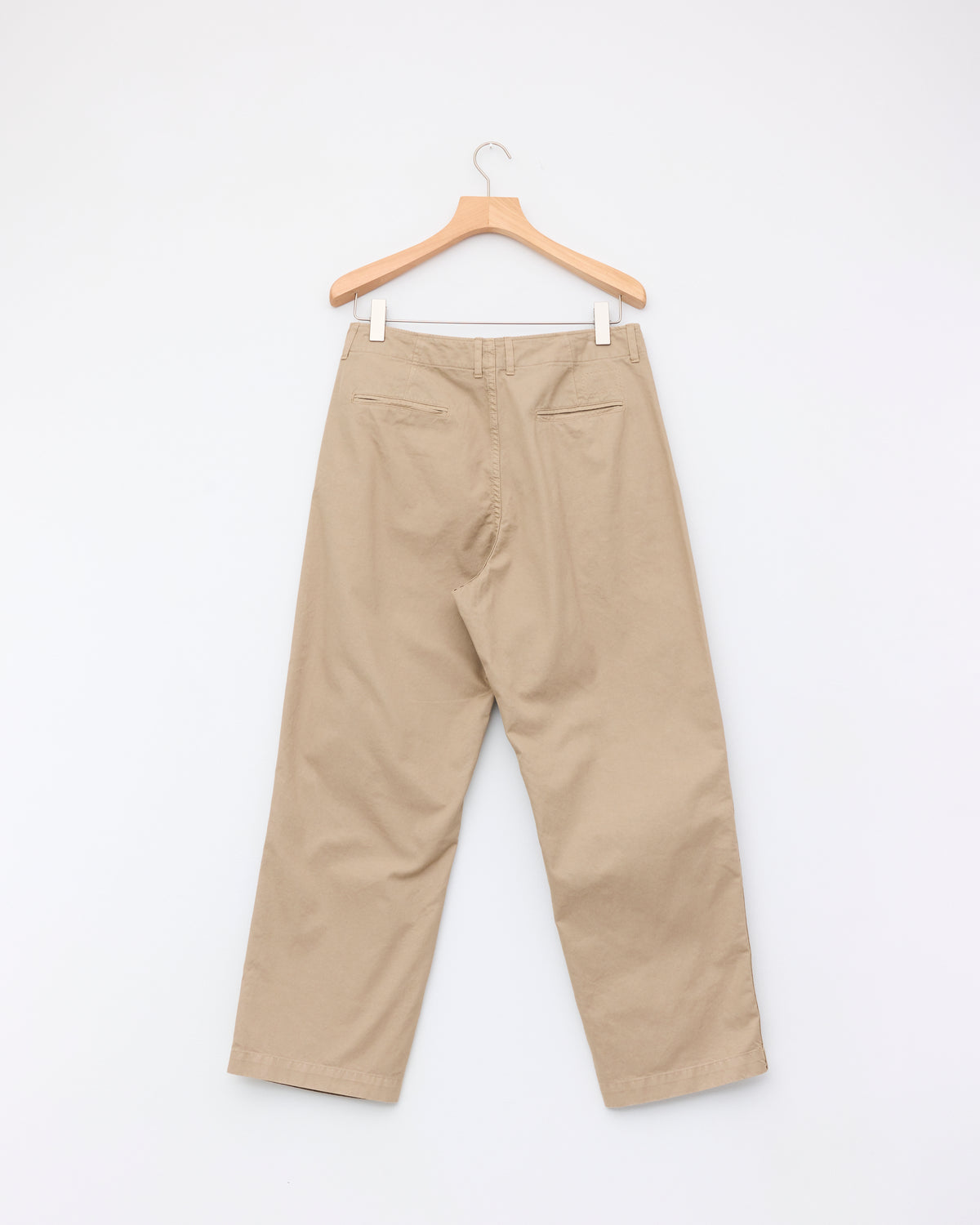 Museum Garments Off-Duty Chino in beige cotton, back, on hanger