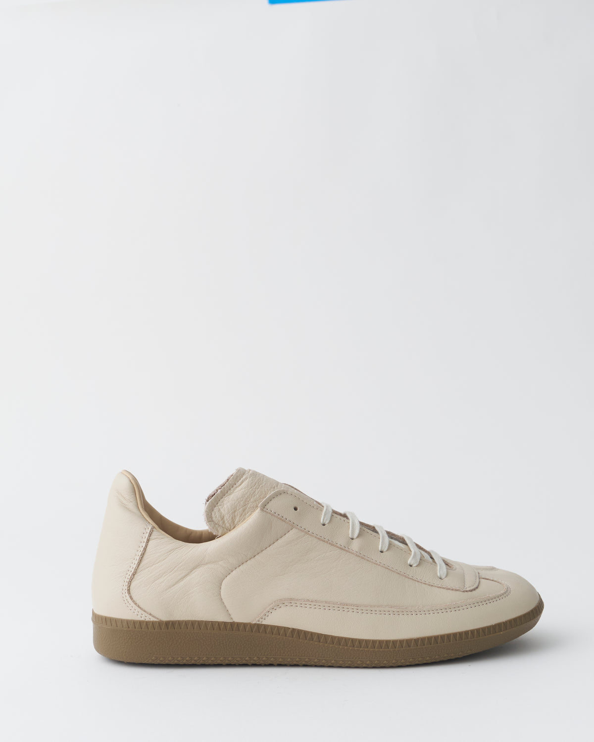 An Irrational Element Sculpture Trainer Leather in off-white, side view