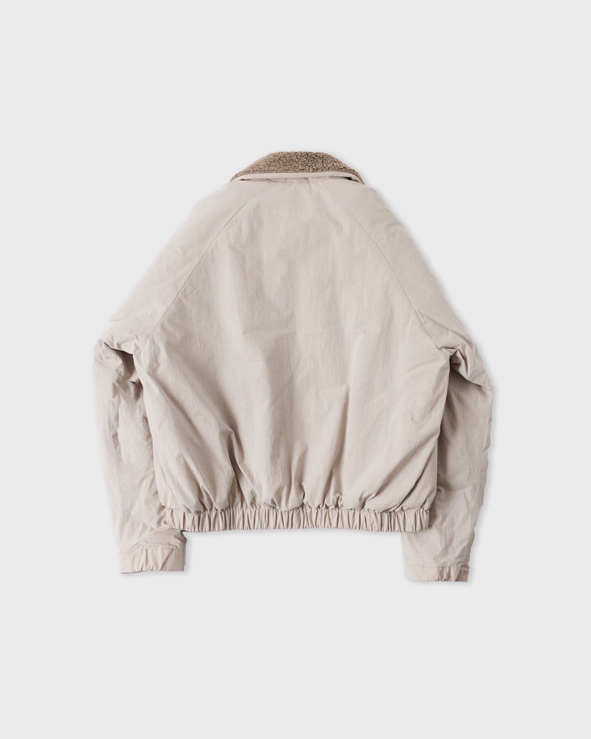 Sage Nation Toya Bomber in light gray cotton-nylon, back, flat lay