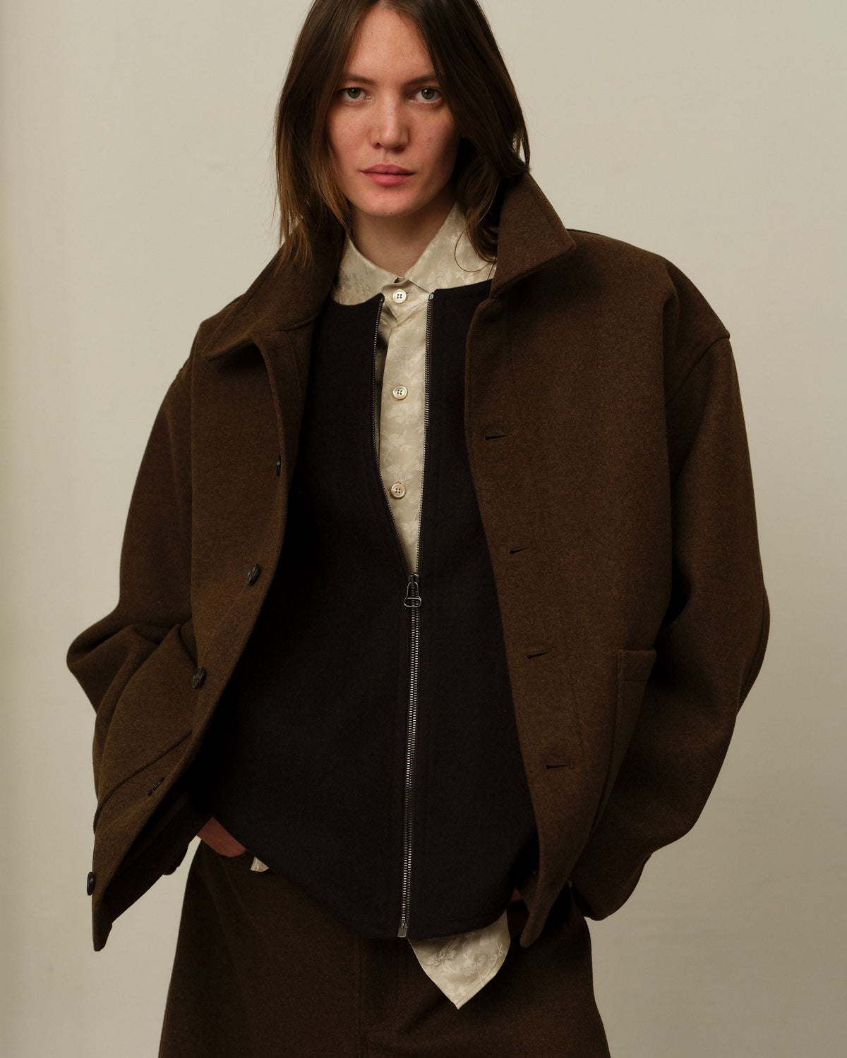 The Colbo Steam Jacket in Brown over a dark zip vest and Bat Shirt in Floral