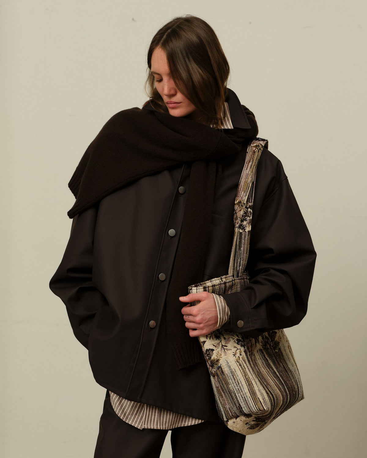 The Colbo Overshirt in Coated Deep Purple with the Tapestry Bag in Melting Florals