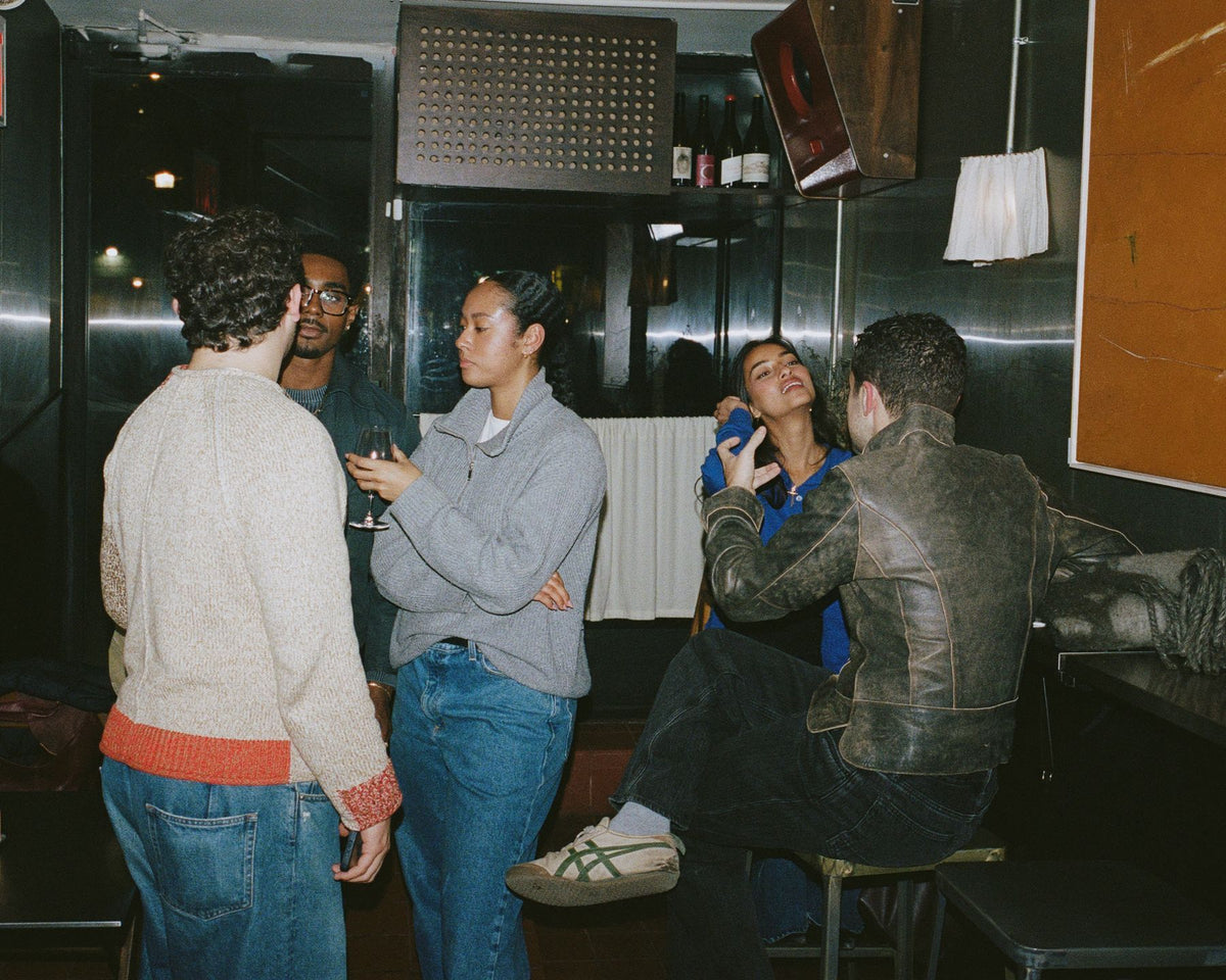 Friends talking at Next Door during a Colbo evening