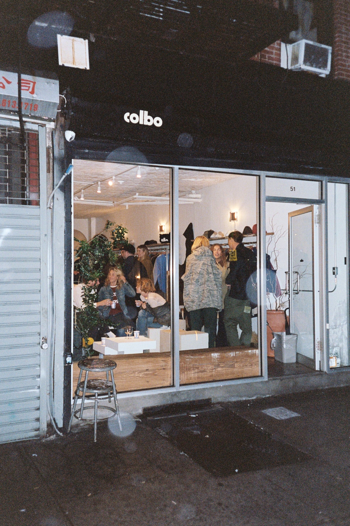 51 Orchard at night, full of people during a pop-up