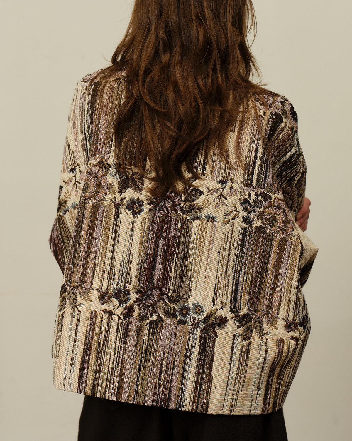 Colbo Omi Jacket in melting florals, on model, back