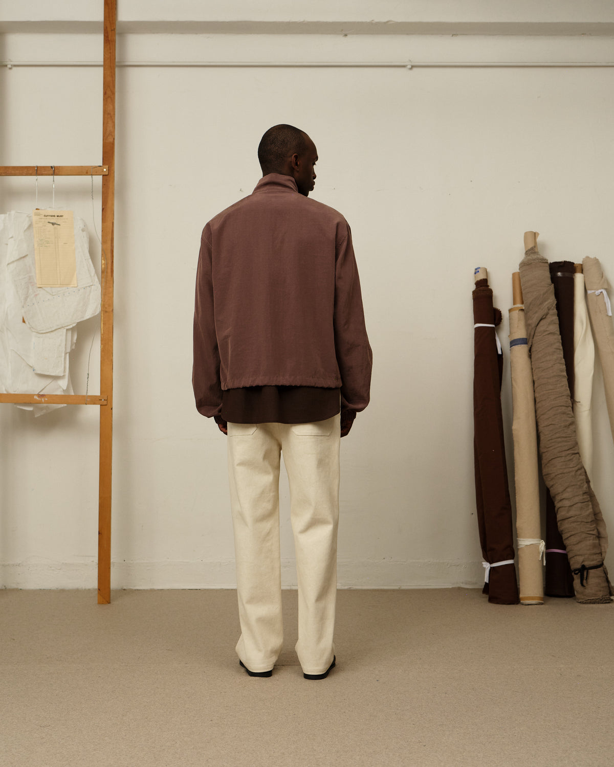 Colbo Track Jacket in mauve, on model, back