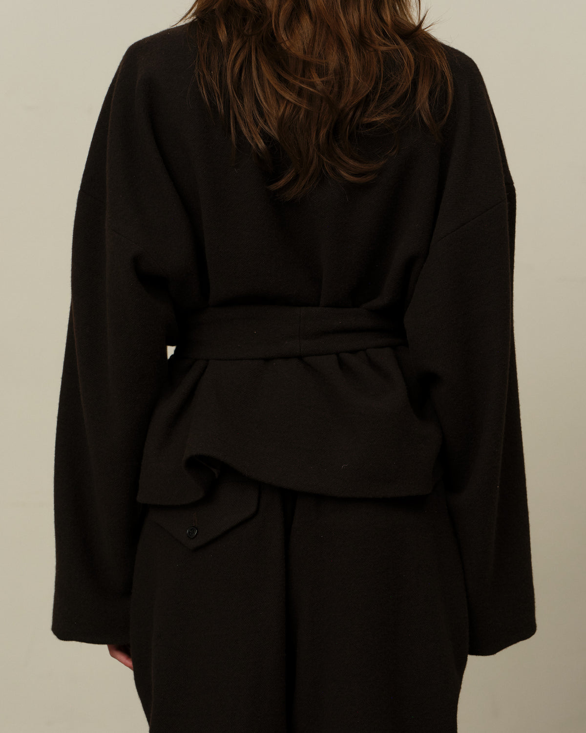 Colbo Omi Jacket in dark plum, on model, back