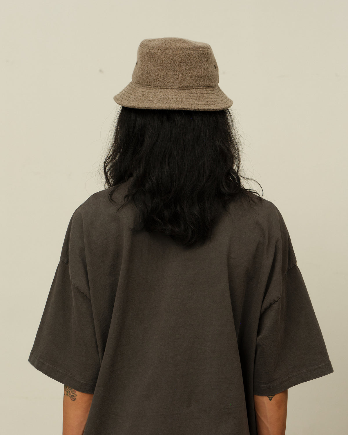 Colbo Bucket Hat in tumble greige, on model, back