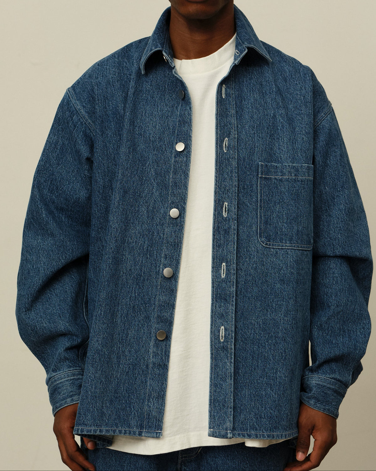 Colbo Overshirt in stone blue denim, on model, front