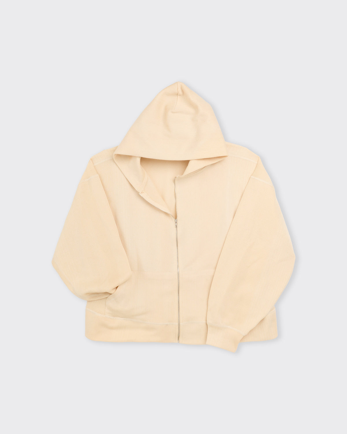 Csillag Cotton Zip Hooded Sweatshirt in sand, three-quarter view