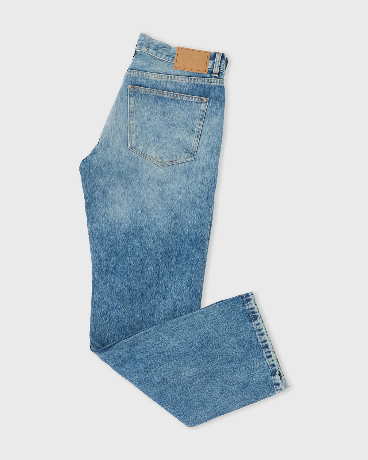 Jeanerica Arrow in light fresco denim, side, folded flat lay