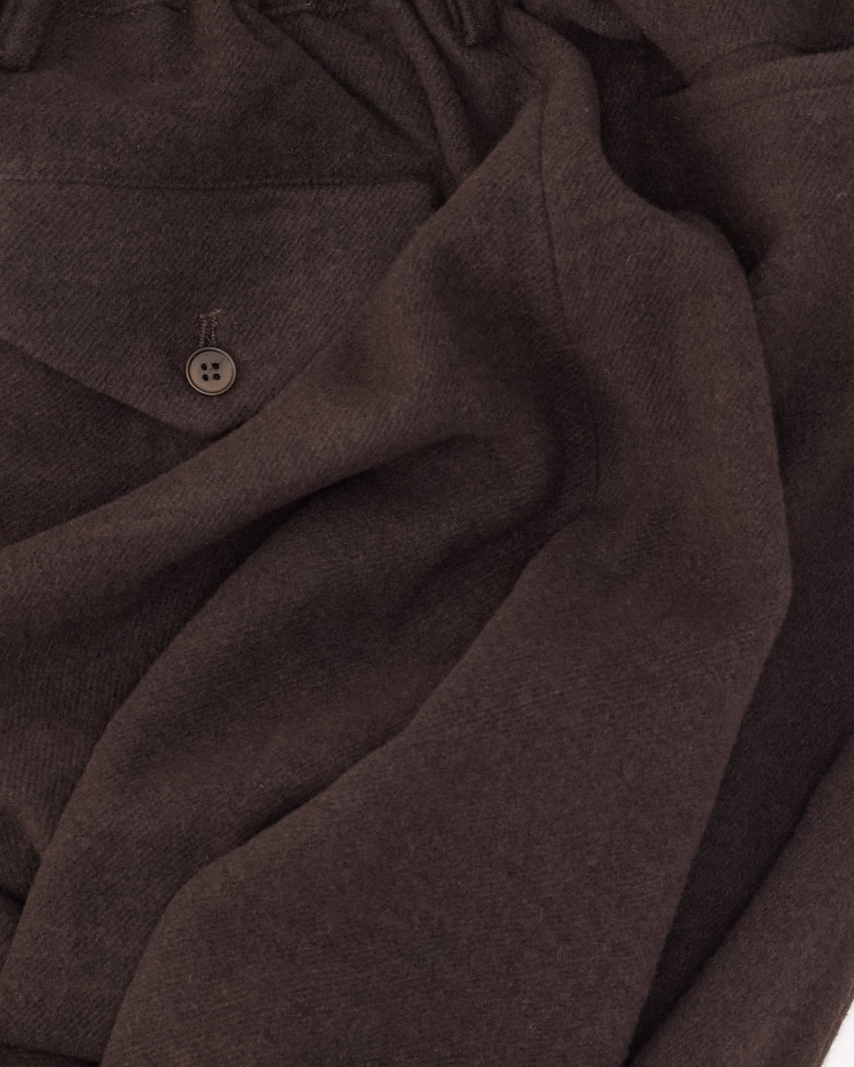 Colbo Camp Pants in dark plum wool, cashmere and linen, fabric and back pocket close-up