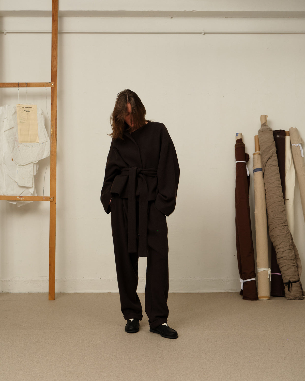 Colbo Omi Jacket in dark plum, on model, full length