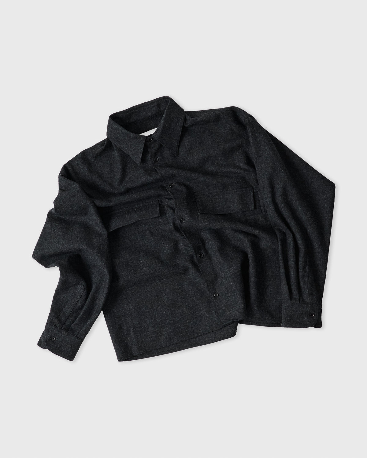 Sage Nation Crop Vincent Shirt in coal lambswool, loosely folded flat lay