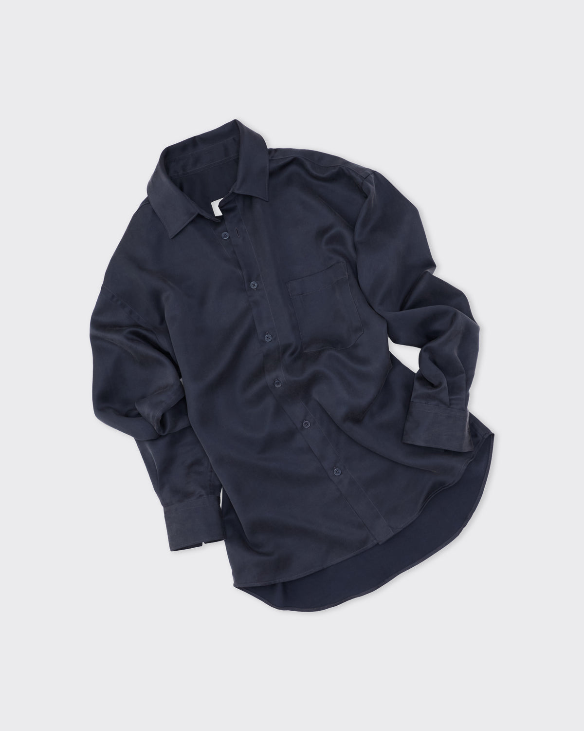 Colbo Banaras Shirt in smooth navy lyocell-wool, front, sleeves rolled, flat lay