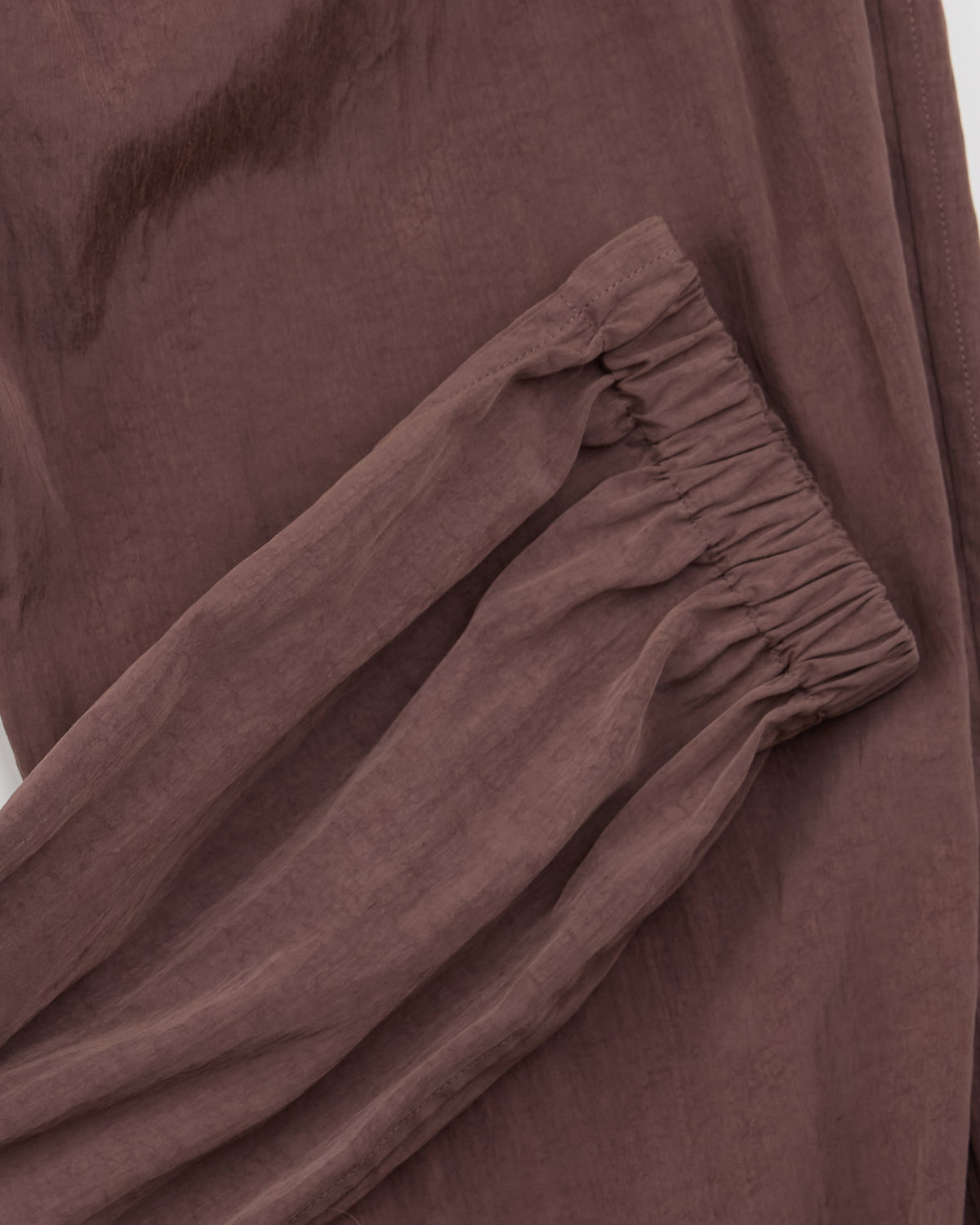Colbo Track Pants in mauve, cuff detail