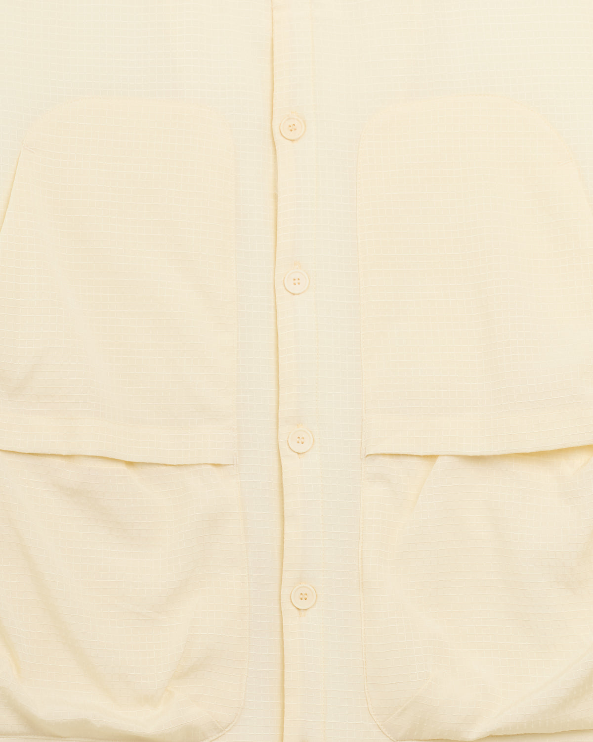 Ranra Epitome Wool Silk Padded Overshirt in pristine, pocket and button close-up