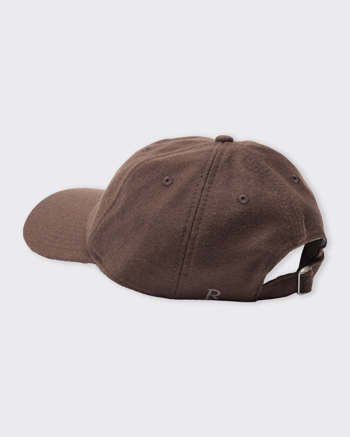 Ranra Cascade Wool Baseball Hat in black coffee, back, showing the leather strap