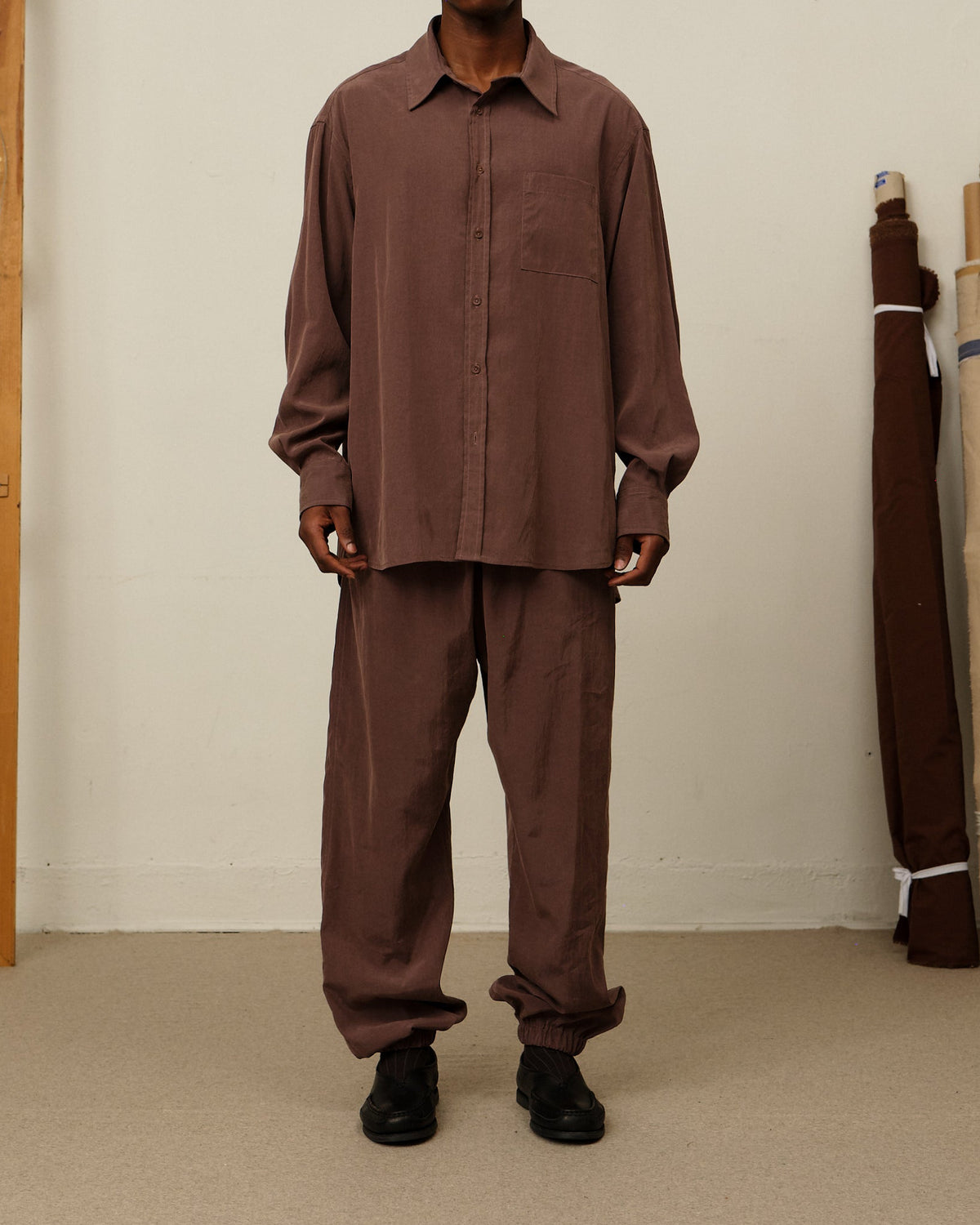 Colbo Track Pants in mauve, on model, full length