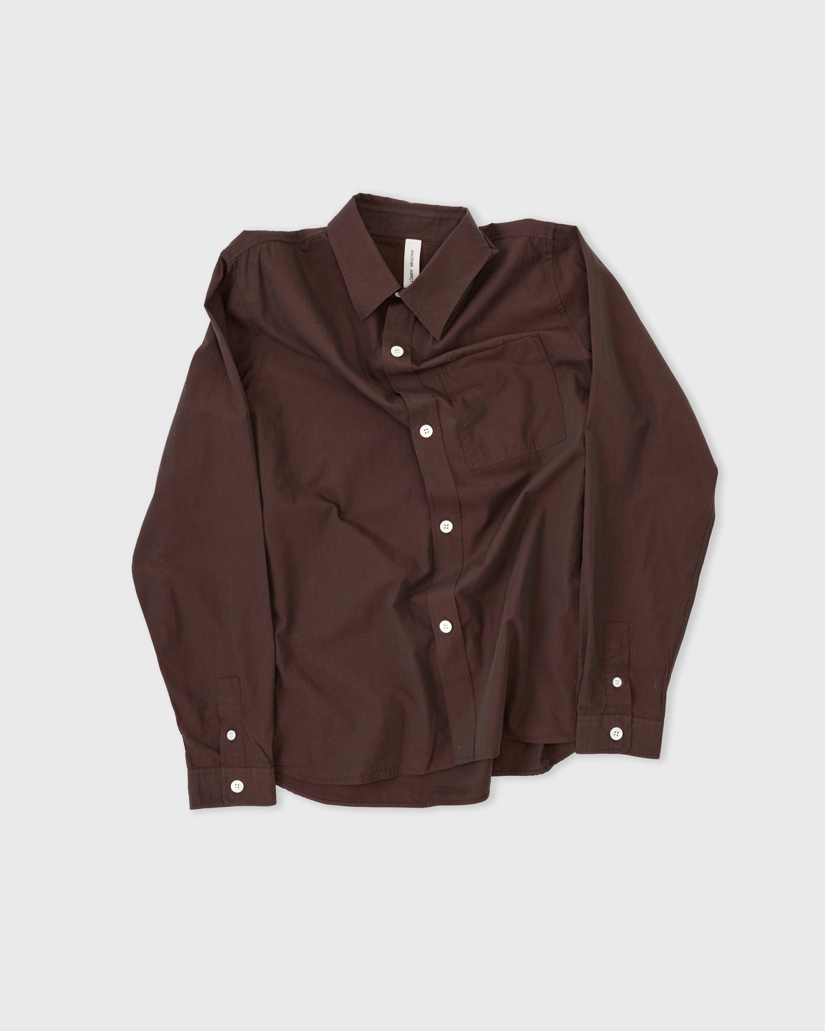 Another Aspect Shirt 4.0 in brown cotton, loosely rumpled, flat lay