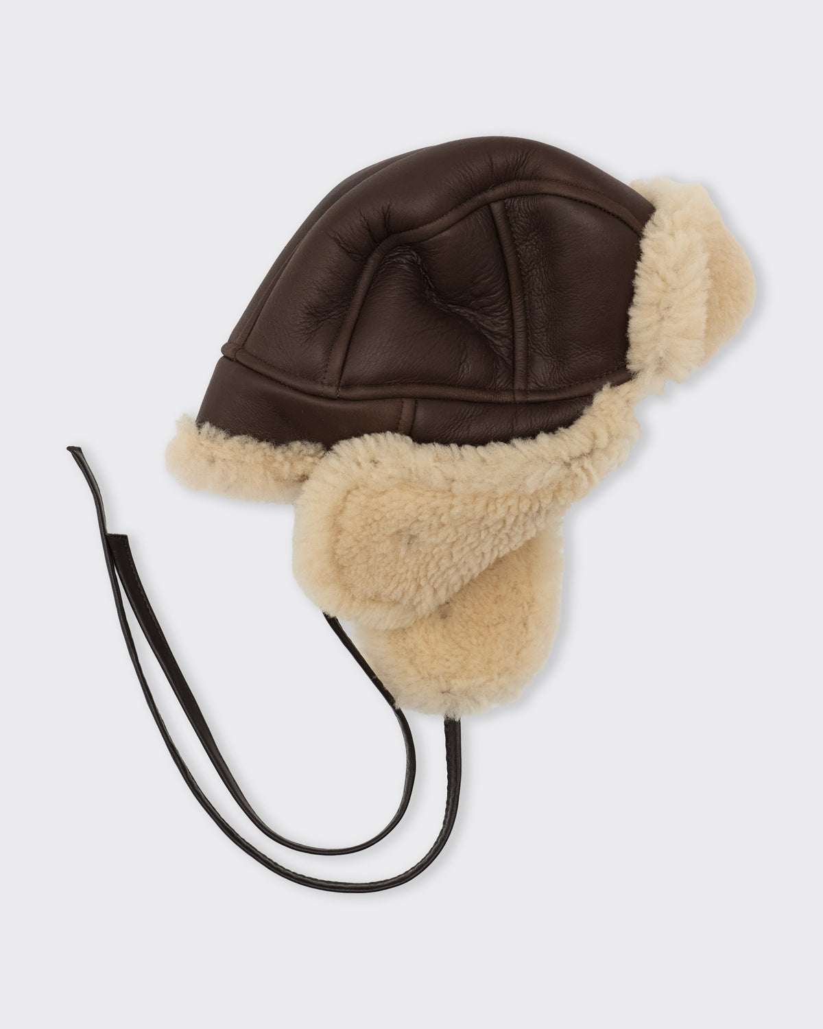 Cawley Leather Back Curly Hair Sheepskin Trapper Hat in chocolate/cream, three-quarter view