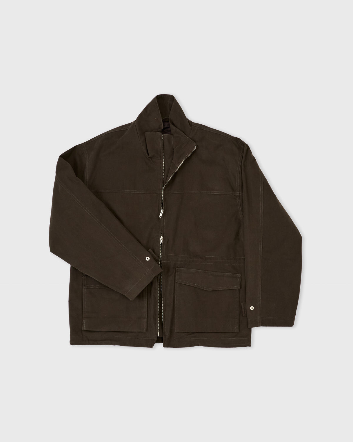Another Aspect Jacket 4.0 in green organic cotton, two-way zip partly open, flat lay