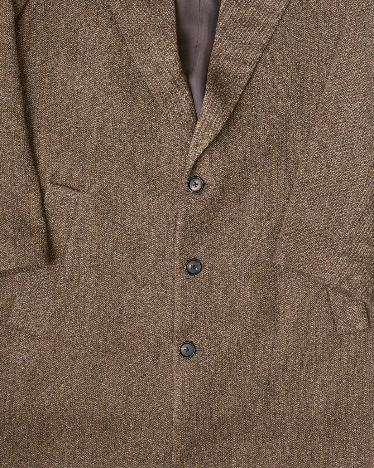 Colbo Suit Overcoat in double brown, lapel and button close-up